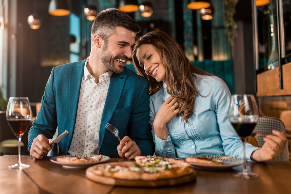 Couple eating at restaurant