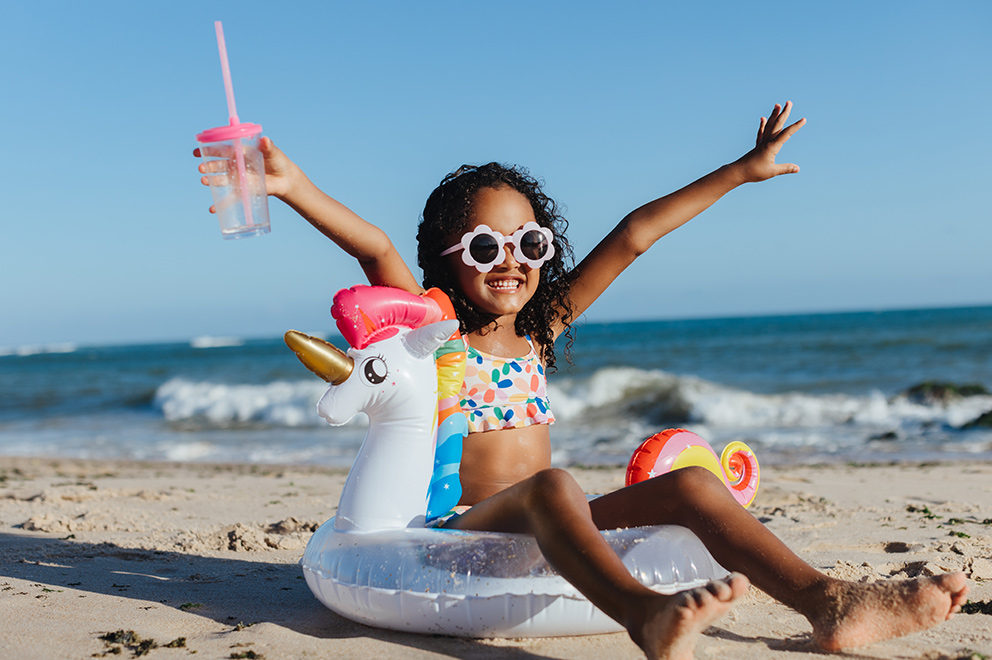 Young girl enjoying the beach