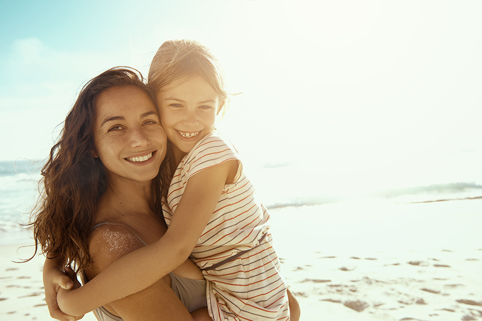 Mother and daughter at the beach