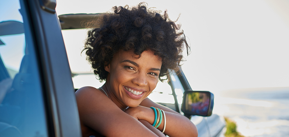 Woman smiling in car