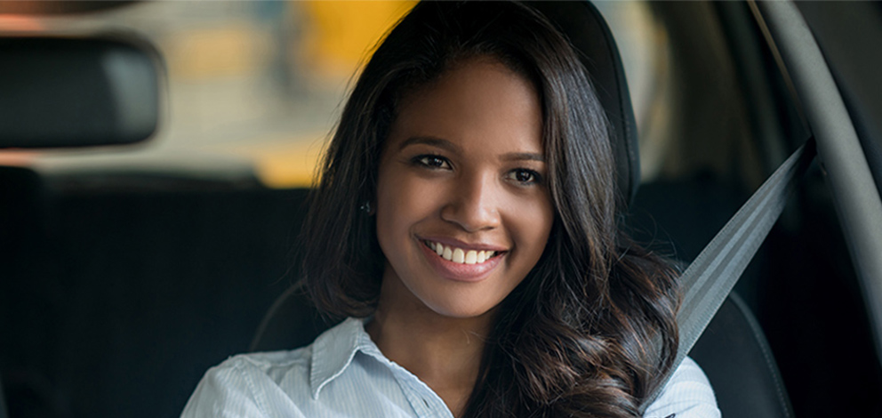 Woman smiling in car